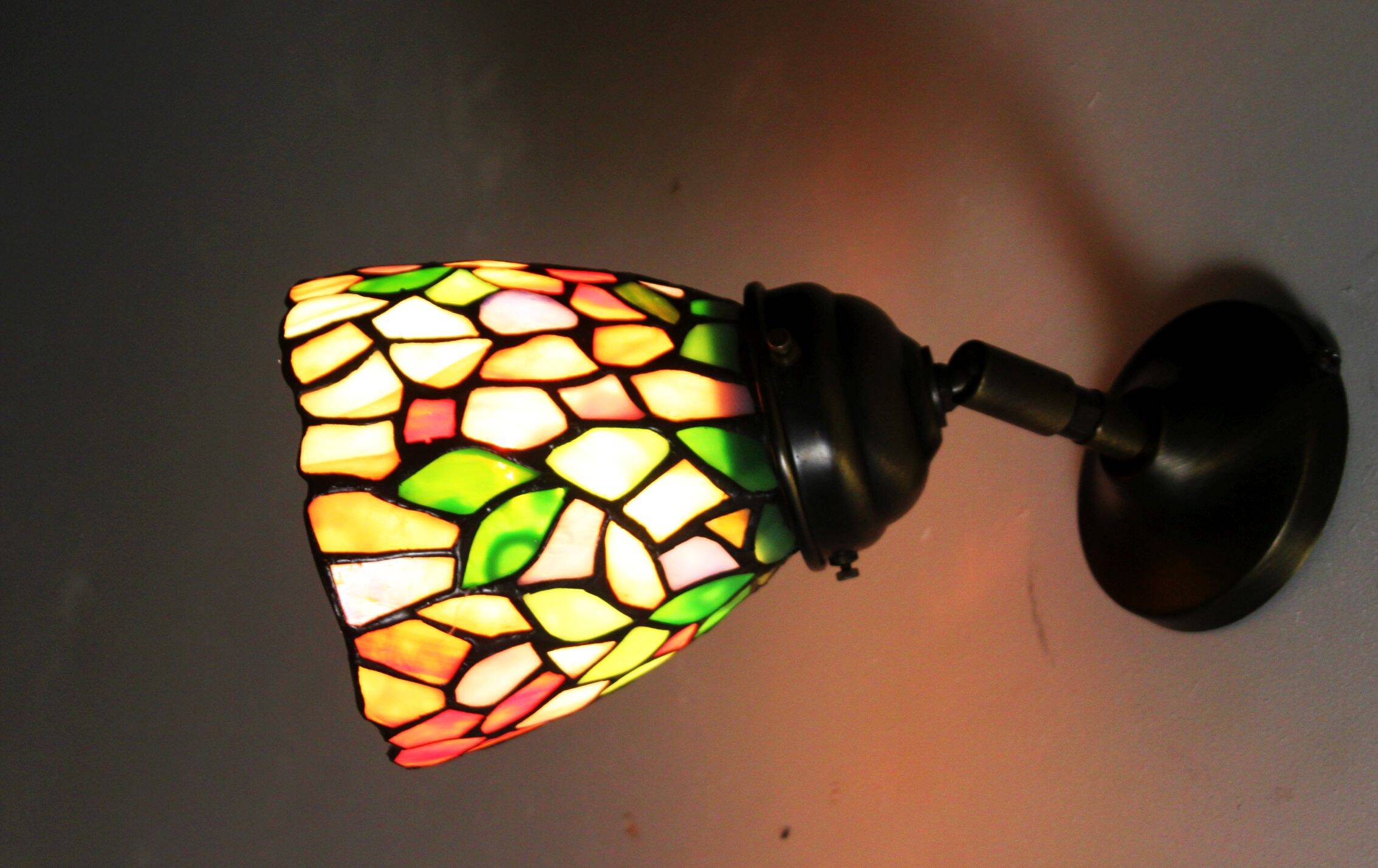 Tiffany lamp, stained glass and tin.