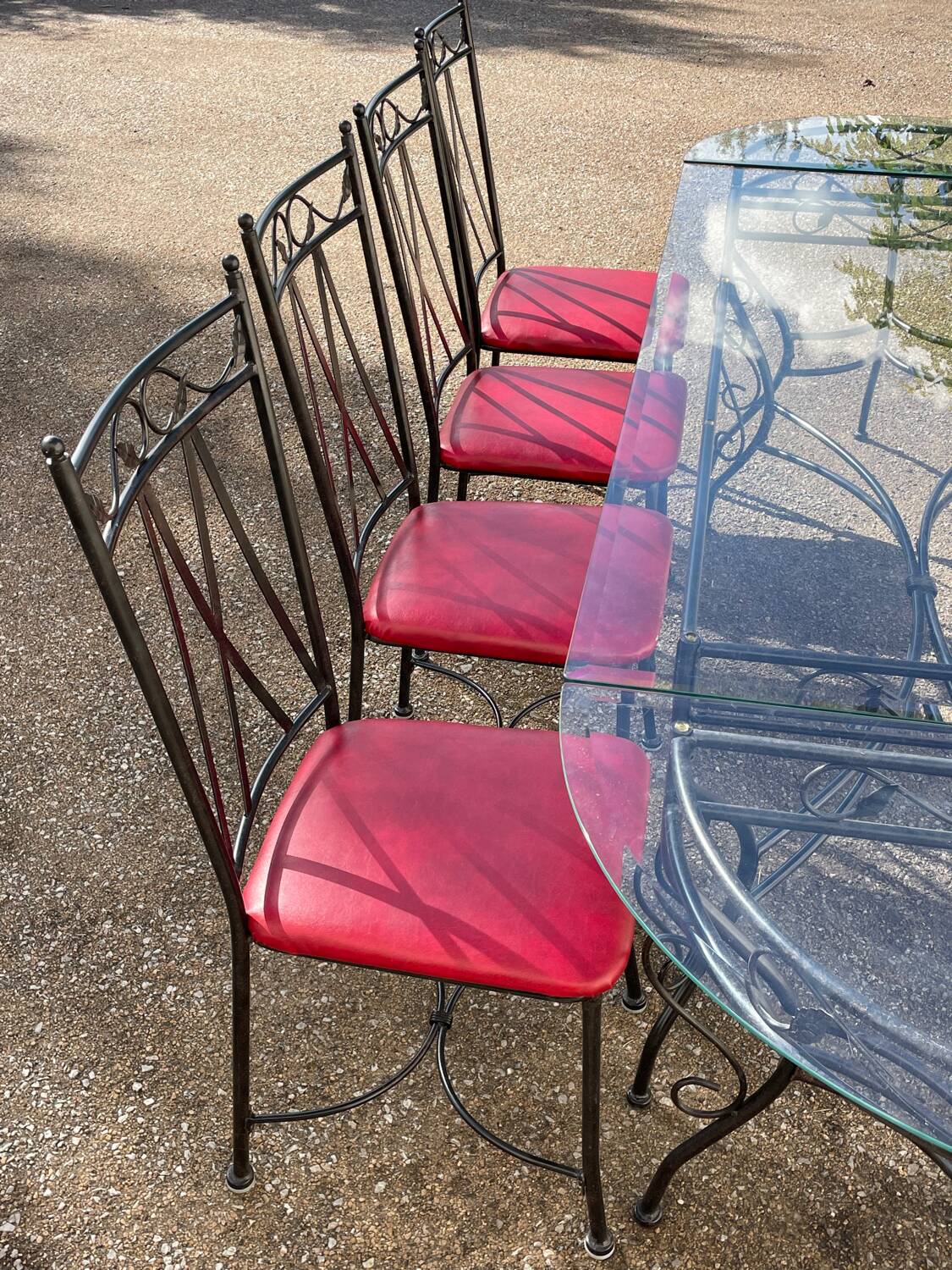 Glass and iron table with two side tables and 8 chairs