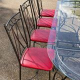 Glass and iron table with two side tables and 8 chairs