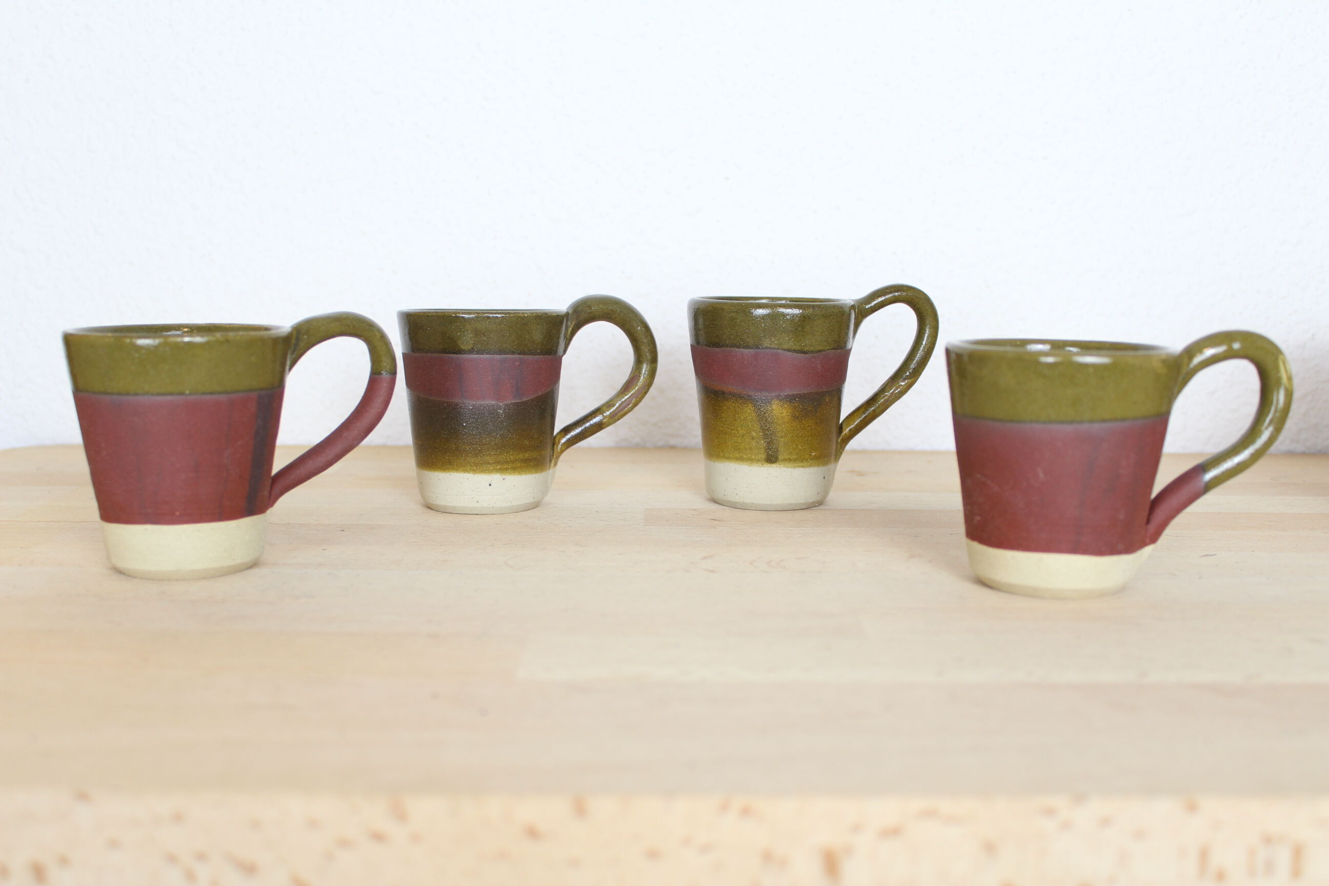 Set of 4 green and purple ceramic cups