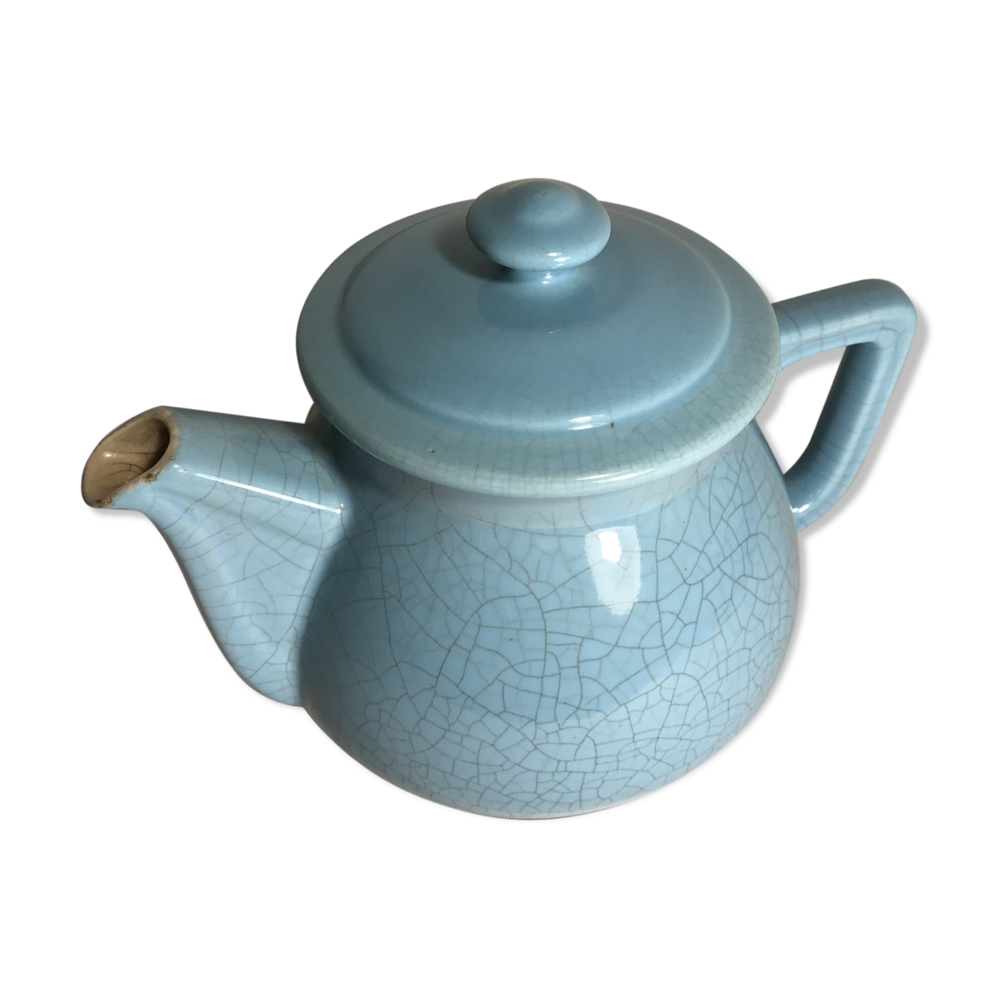 Cracked blue ceramic vintage teapot