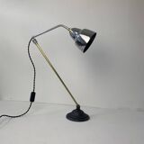 Old articulated industrial workshop lamp