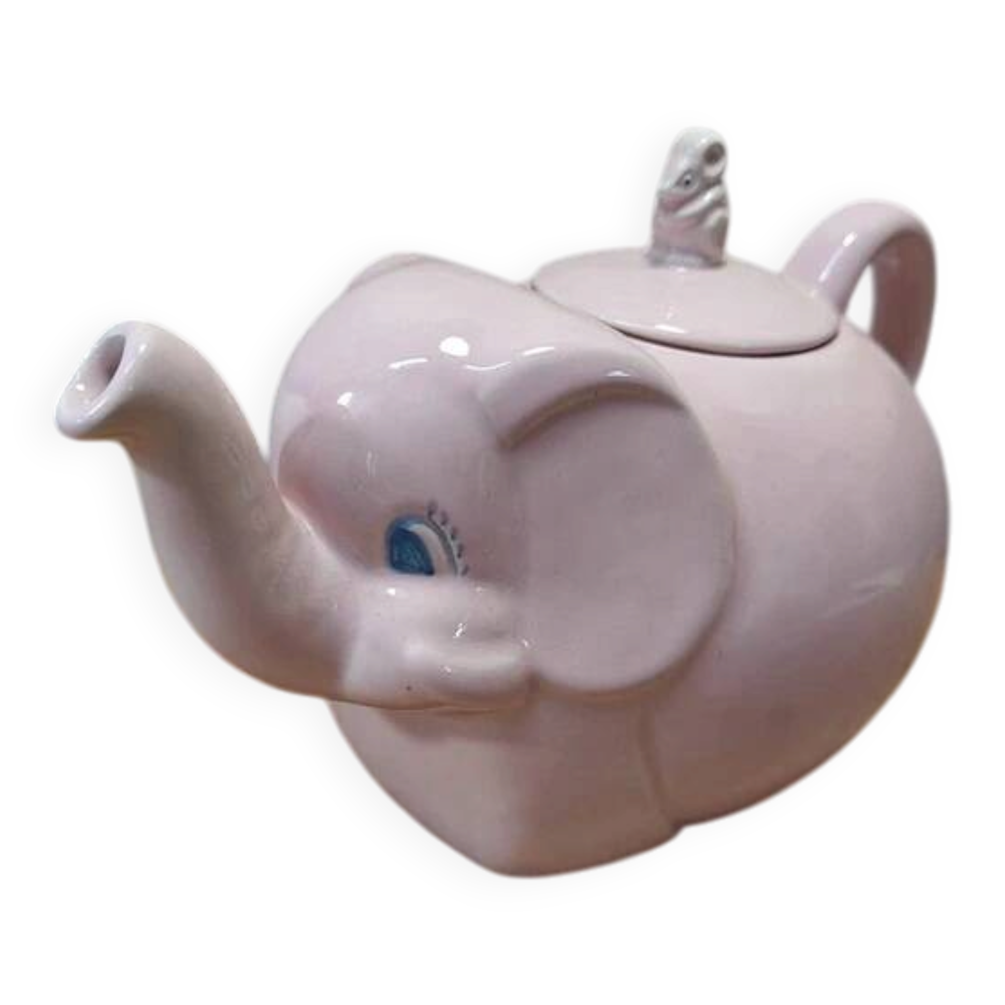 Antique pink elephant teapot in earthenware.