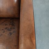 Comfortable and adjustable sheepskin relax armchair with a sleek design