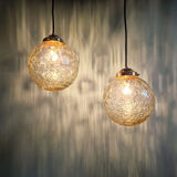 Pair of amber bubble glass pendant lights, 1970s