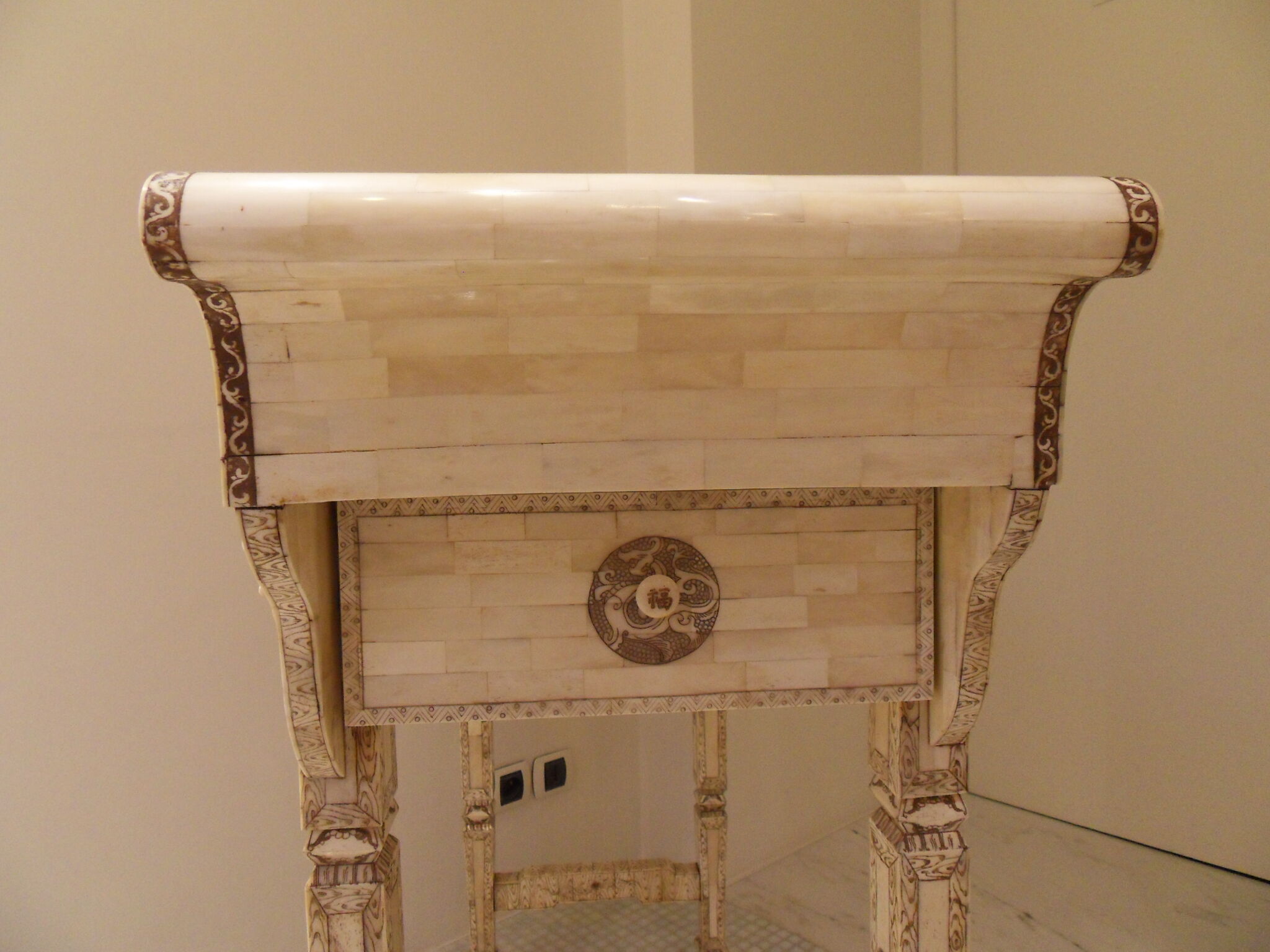 Console carved in wood and white bone