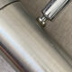 Pair of brushed metal wall sconces