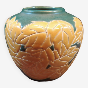 Ceramic ball vase with yellow and green leaf patterns