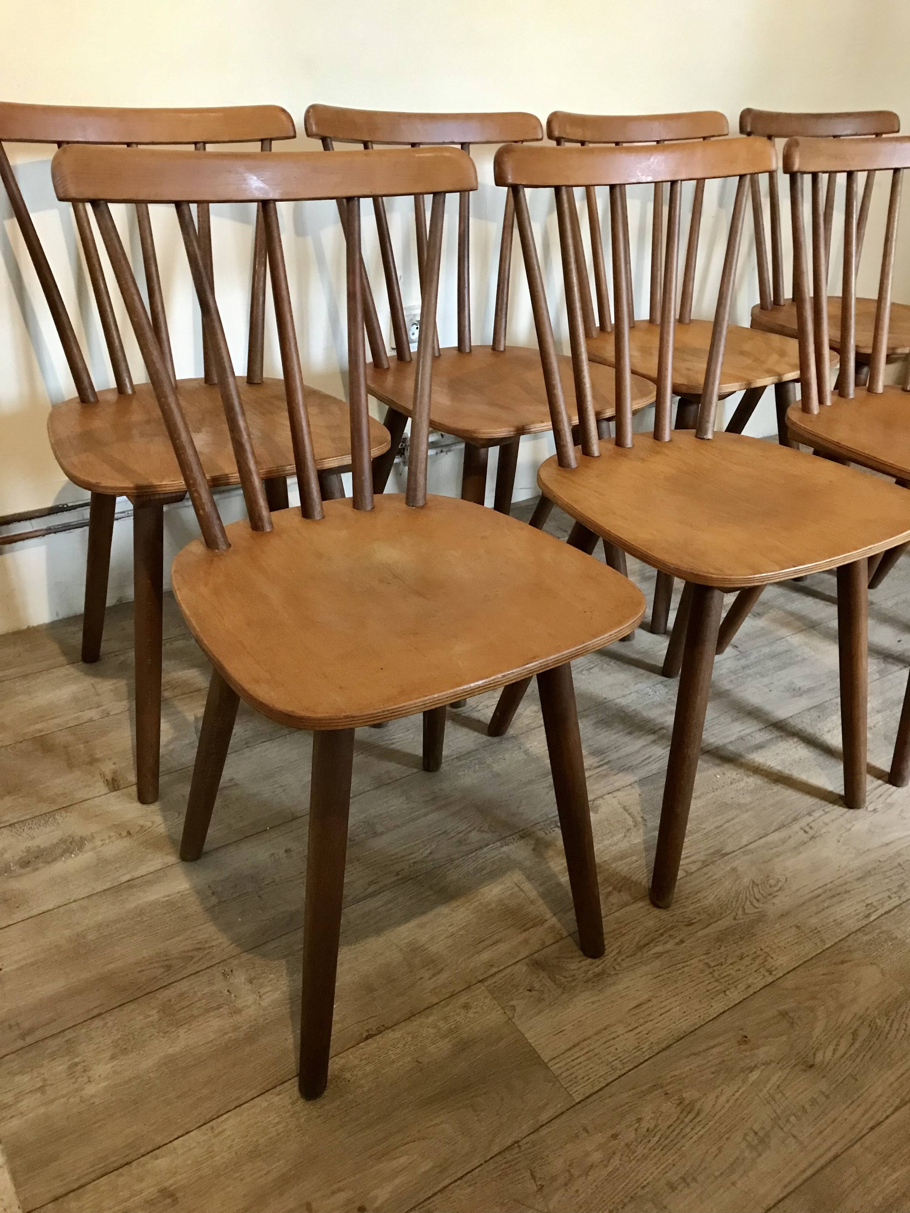 Set of 8 vintage chairs with bars and compass legs 1960