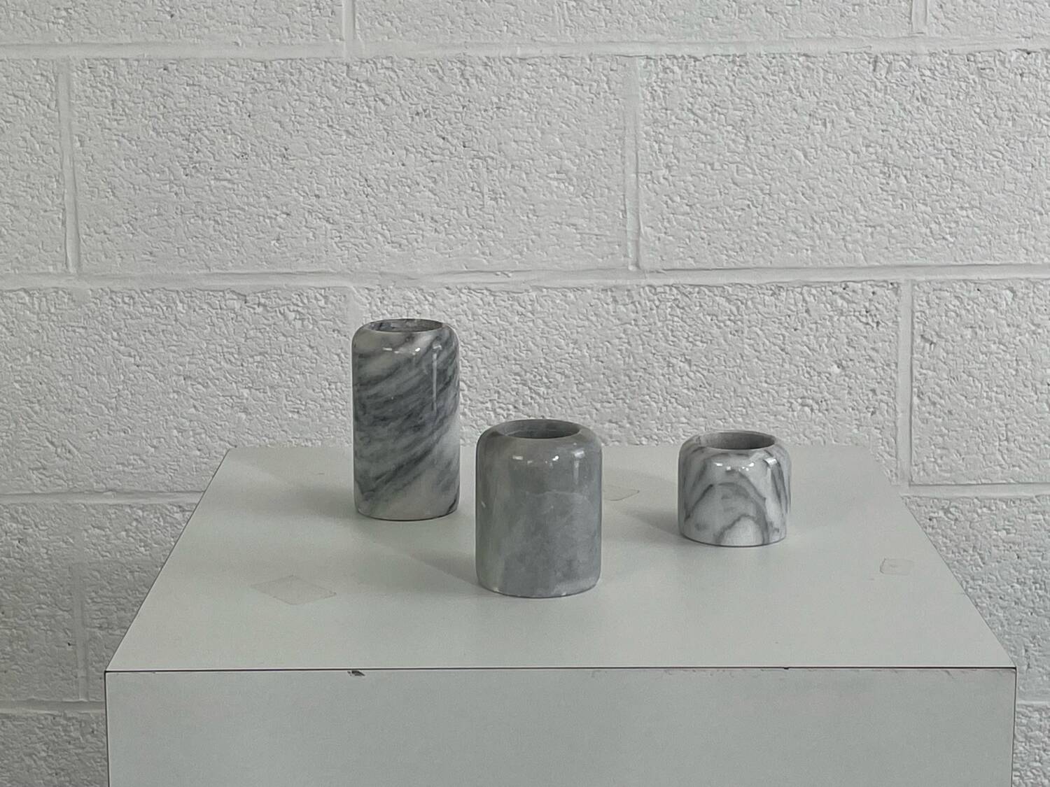 Pair of marble candlesticks