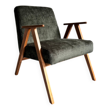 Fauteuil vintage restauré de style mid-century moderne, chaise lounge verte forêt