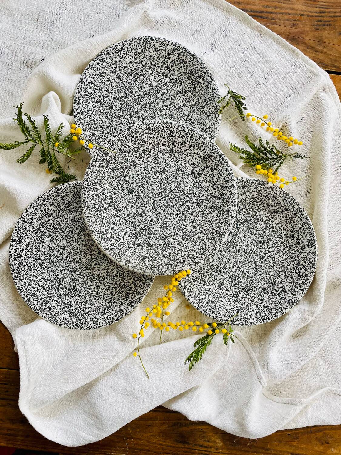 Set of 4 speckled black and white ceramic plates made in Italy