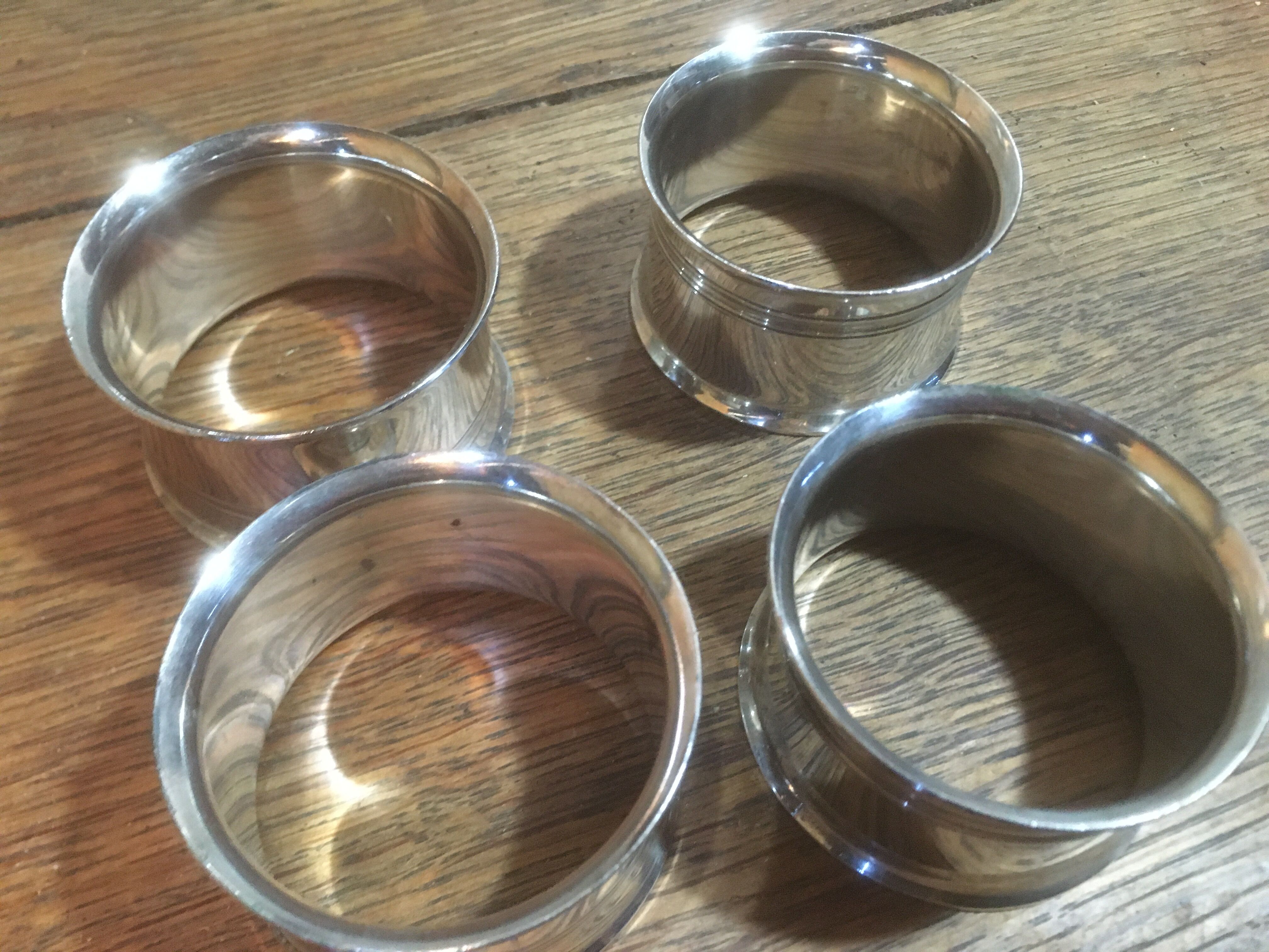 Set of 4 silver metal napkin rings