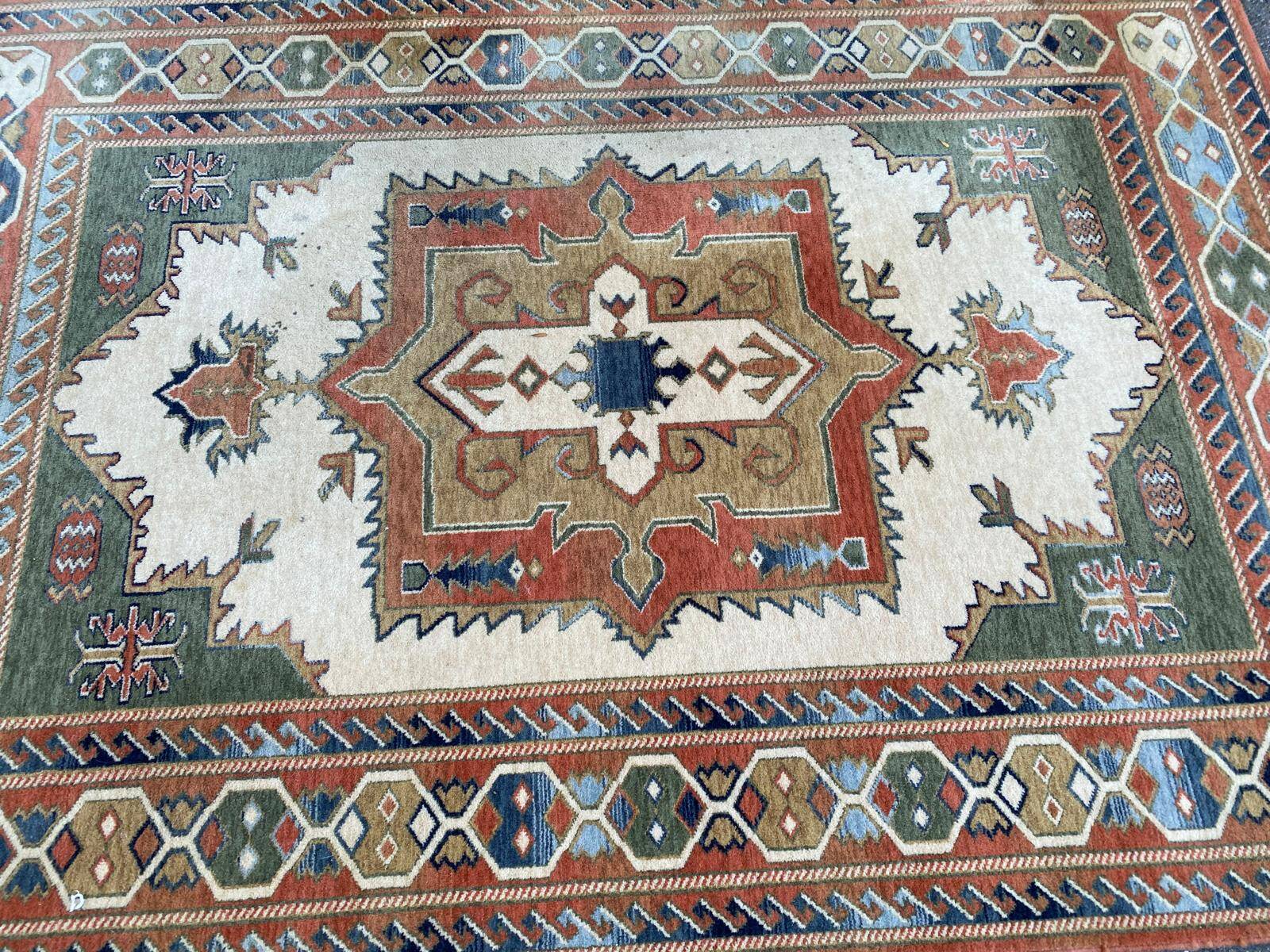 Large oriental wool rug with terracotta geometric patterns 200x300cm