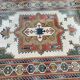 Large oriental wool rug with terracotta geometric patterns 200x300cm