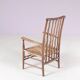 1930s small low spindle-back hearth chair / side chair with wicker seat, Arts & Craft Movement, Morris & Co for Liberty and Co, Stowaway London