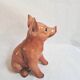 Beautiful, handcrafted porcelain figurine of a piglet, made by Capodimon.