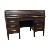 Vintage American wooden desk with a roll-top.