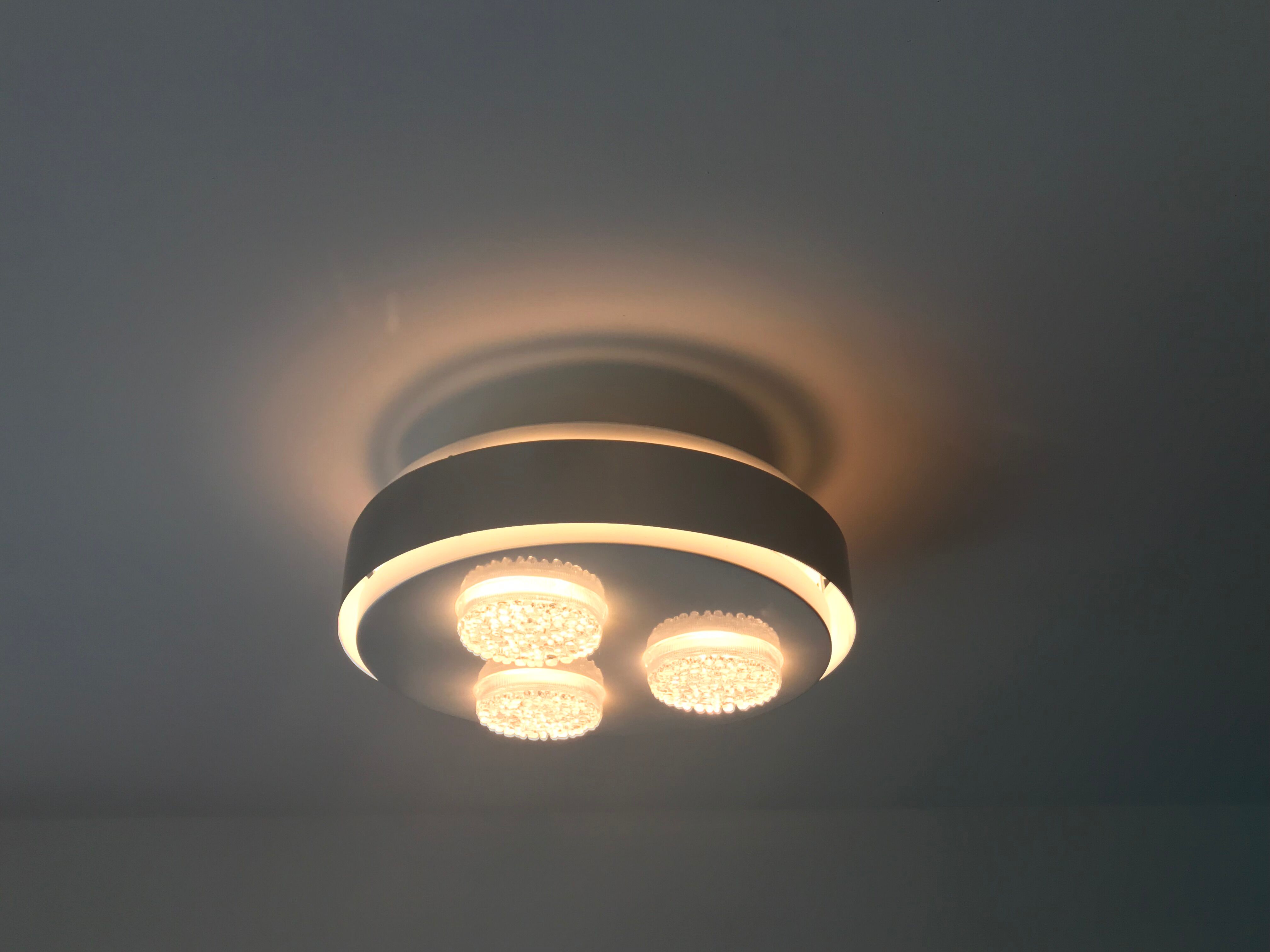 Round ceiling lamp white and grey Raak Holland