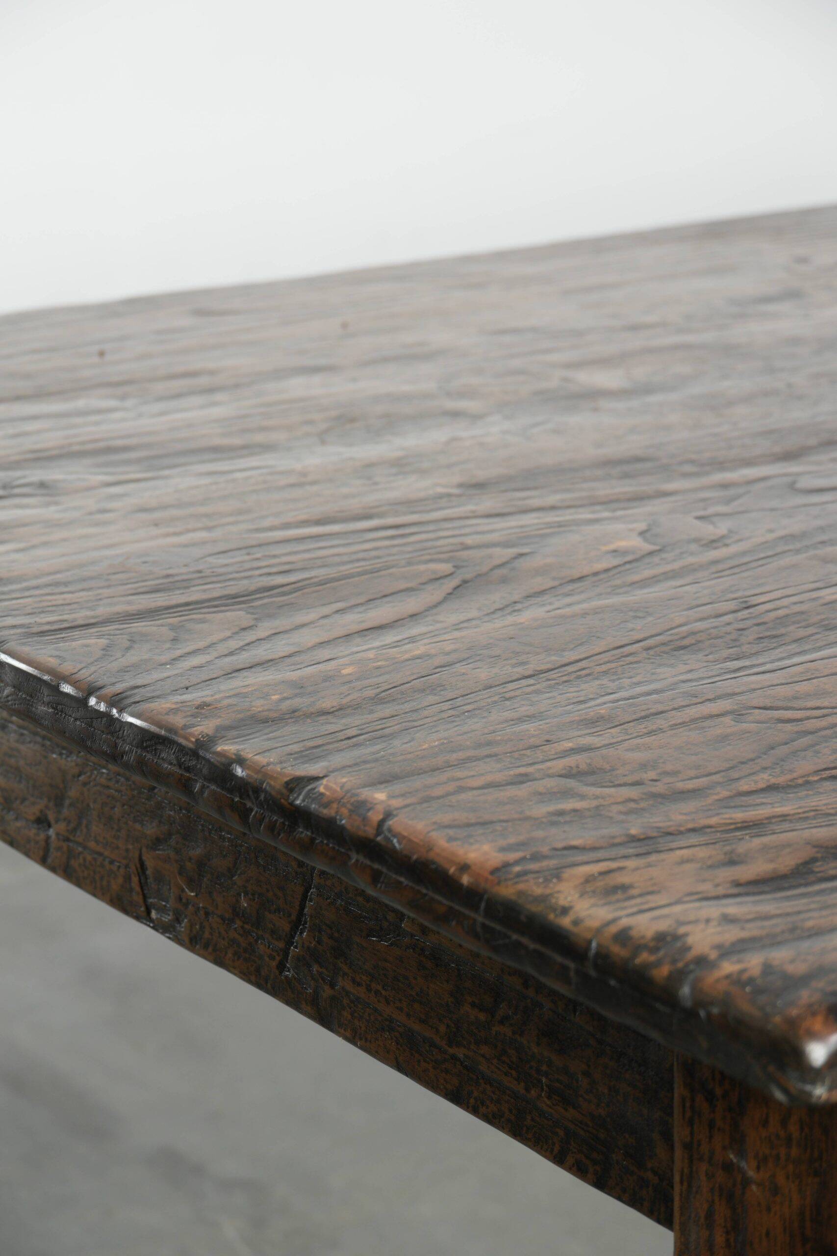Large rustic dining table made of atmospheric elm wood with fine details