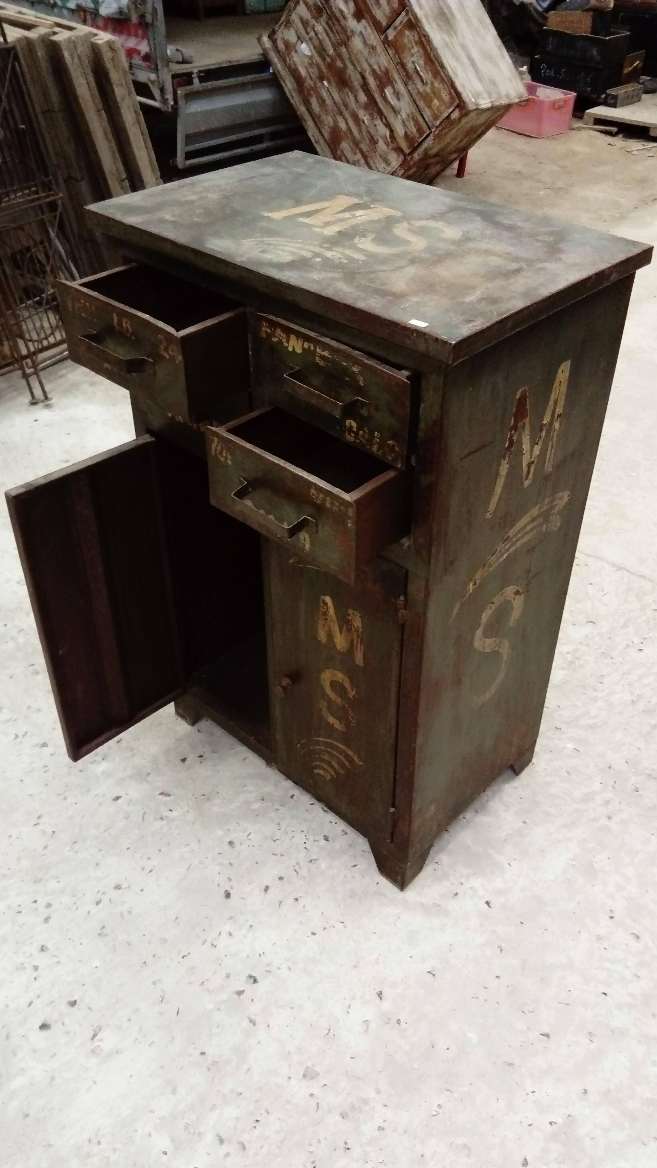 Patinated metal workshop furniture.