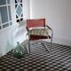 Vintage armchair in chrome and cognac leatherette