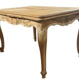 Walnut table, two extensions, parquet top, carved crosspiece