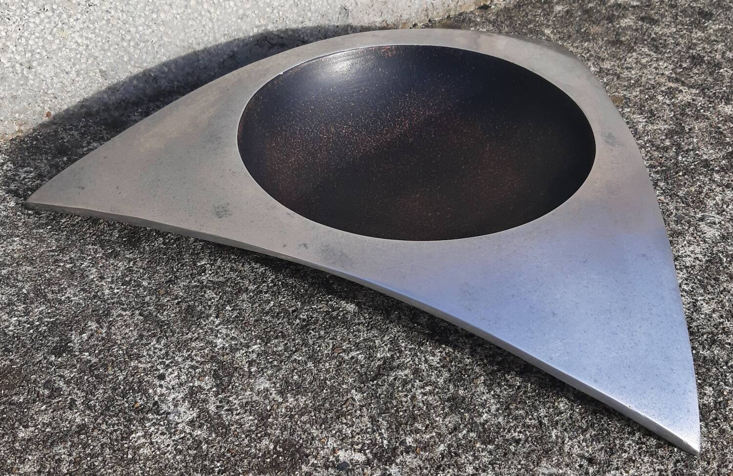 Cast aluminum ashtray or pocket emptier