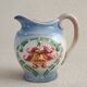 Earthenware milk jug