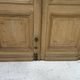 Pair of Haussmann-style double passage doors in patinated oak from the 19th century.