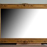 Nineteenth century monumental mirror in gilded wood