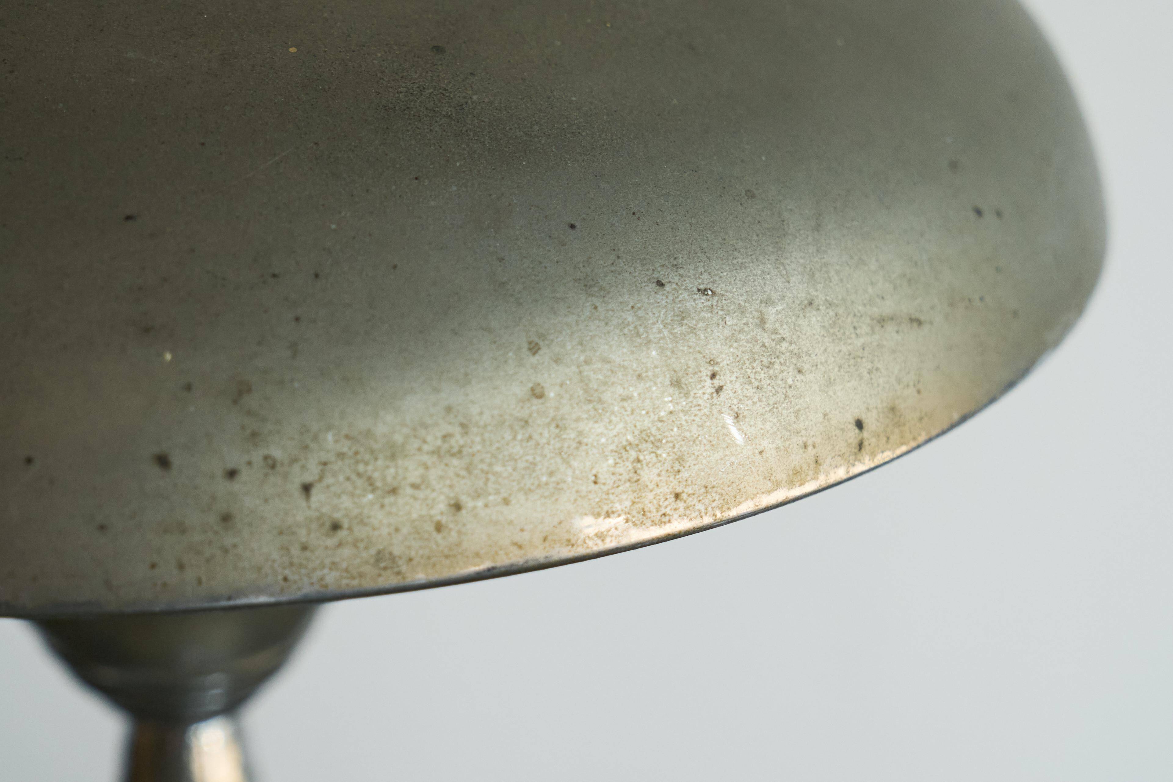 Patinated brass and chrome table lamp from the 1950s.