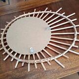 Oval rattan sun mirror