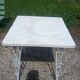 Wrought iron bistro table.