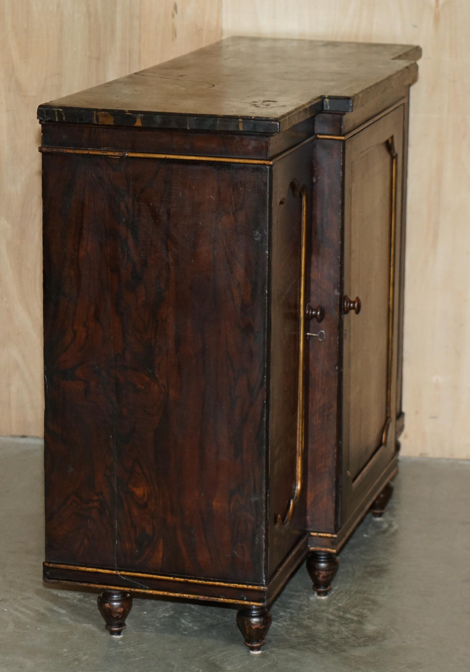 Regency 1810 library buffet in simulated hardwood with Chinese decoration.