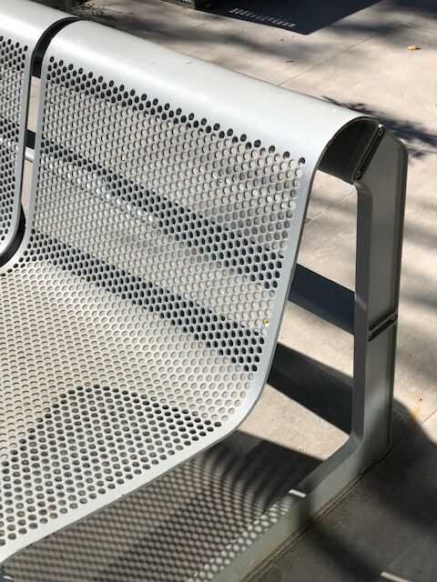 Perforated metal garden bench