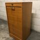 Vintage curtain-shaped binder in light honey-coloured oak