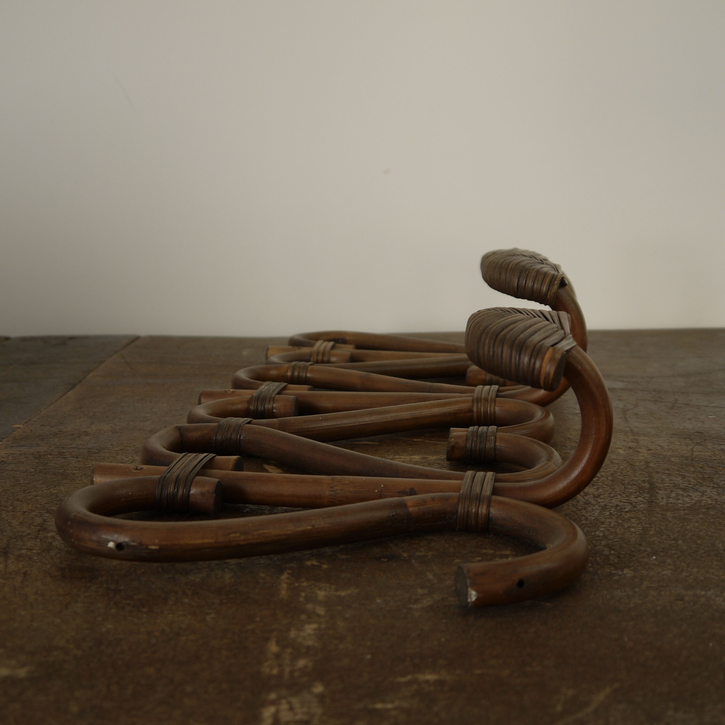 Rattan coat hanger