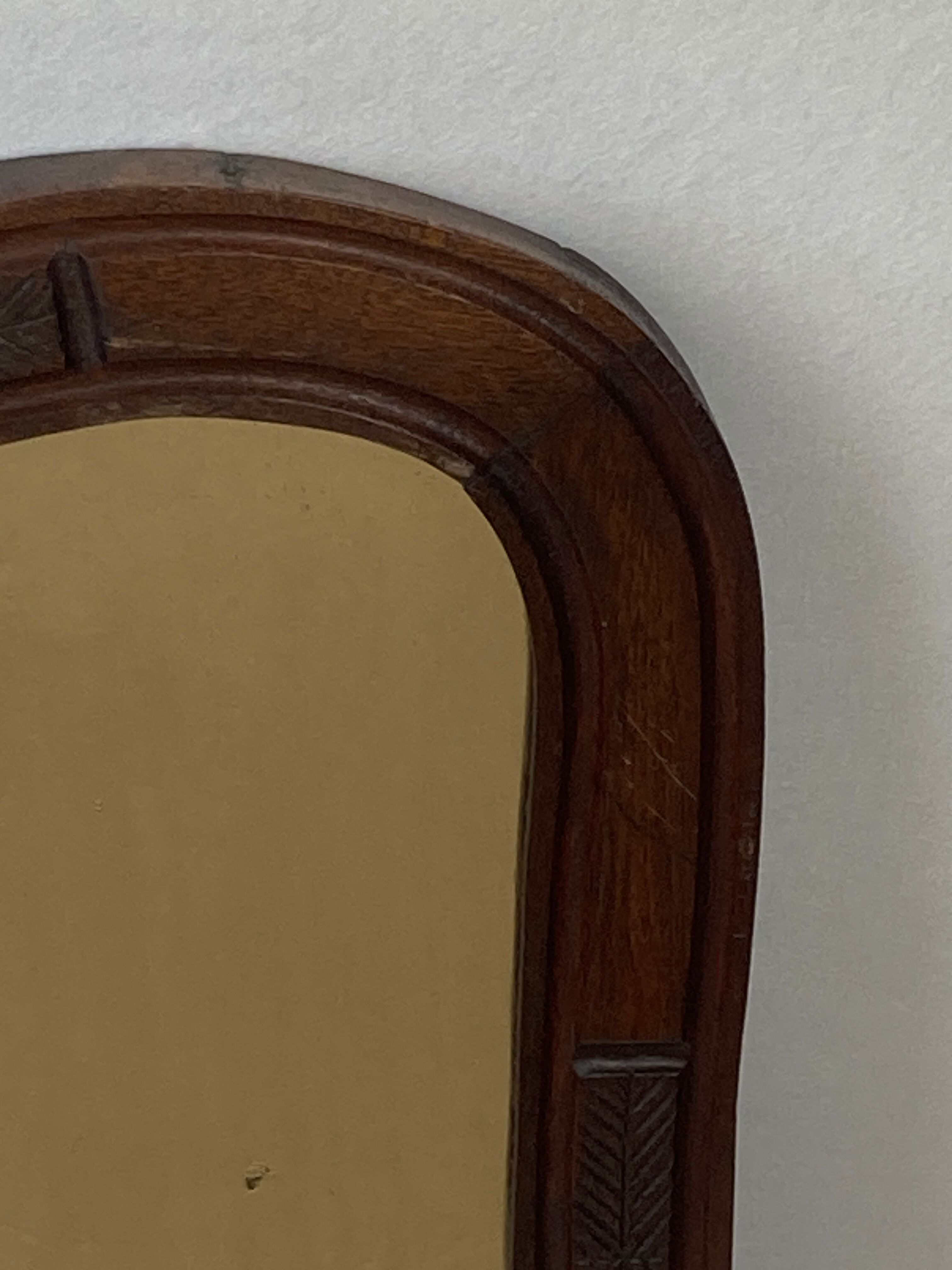 Hand carved wavy curvy vanity mirror, ca 1900