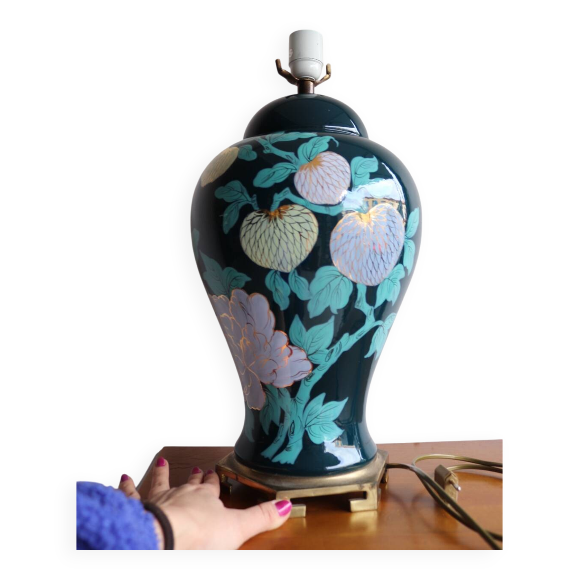 Vintage ceramic lamp with floral decoration.