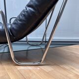 Pair of vintage armchairs in black imitation leather and chrome metal, France 1970