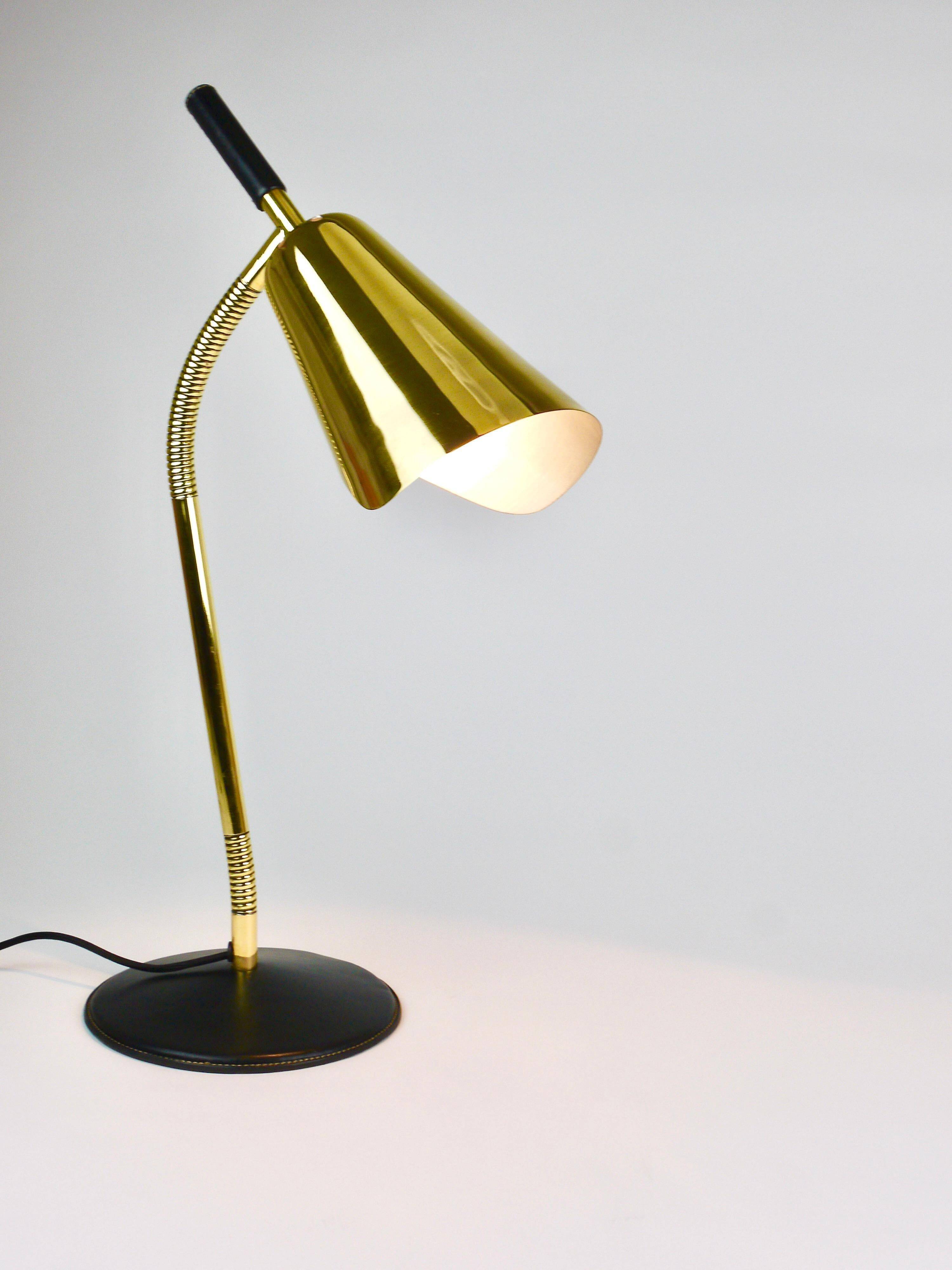 Rare desk and table lamp in brass and leather by Carl Aubock II #4280, Vienna, Austria.