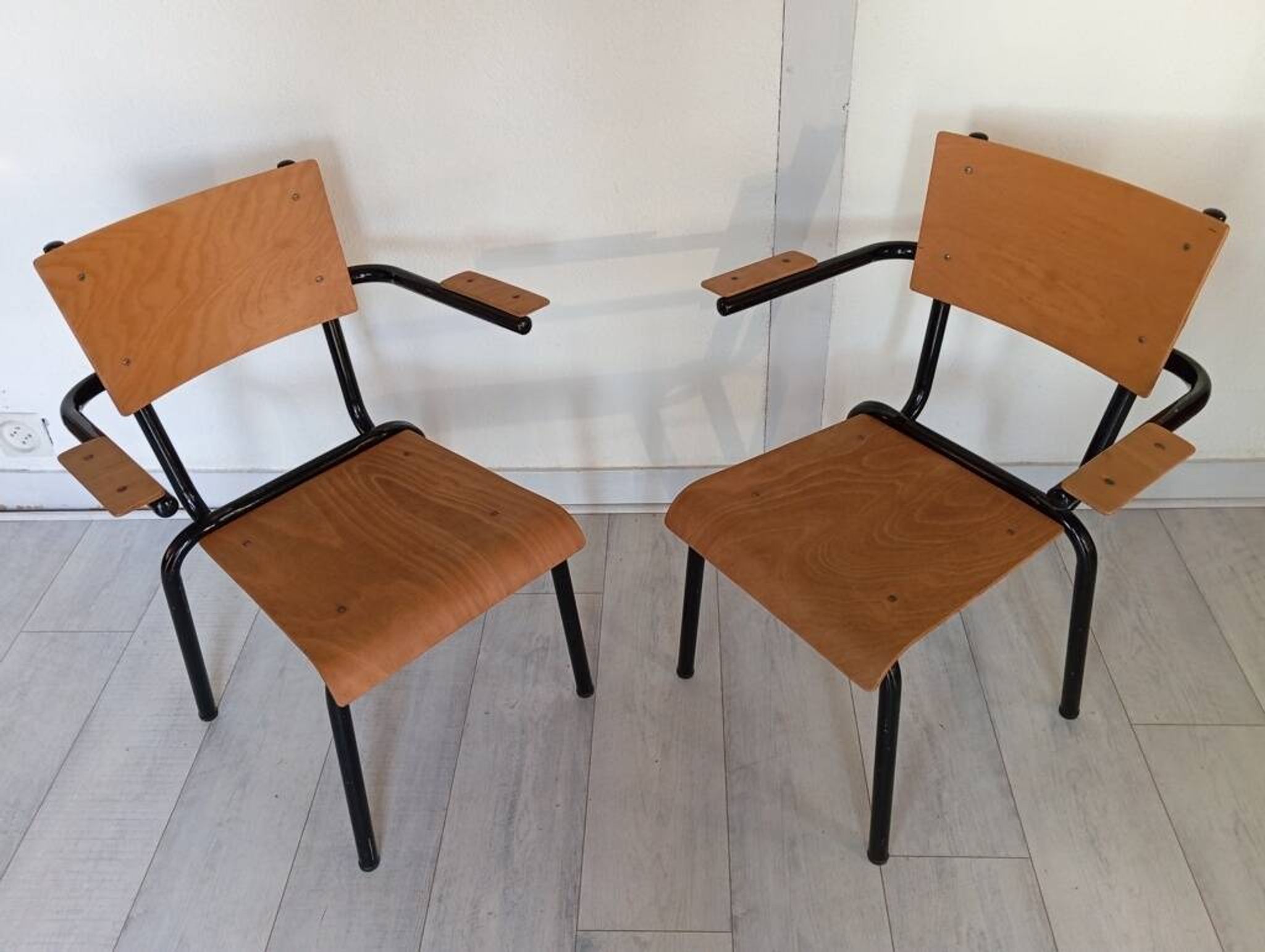 Pair of tubular metal armchairs 1954