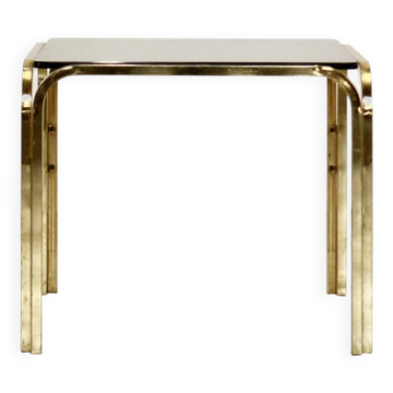 Table basse italienne du milieu du siècle en laiton et verre fumé