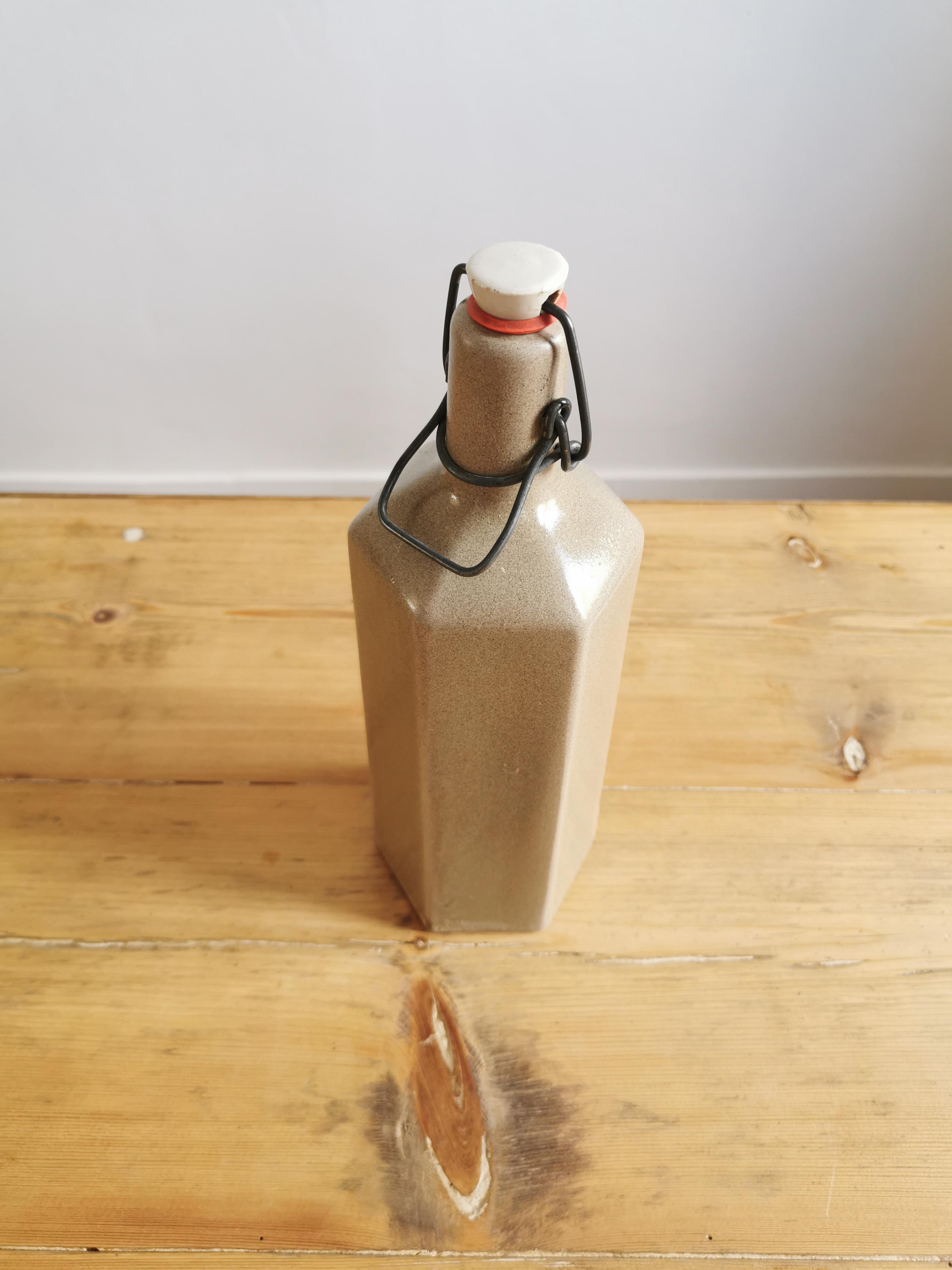 Hexagonal sandstone bottle