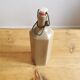 Hexagonal sandstone bottle