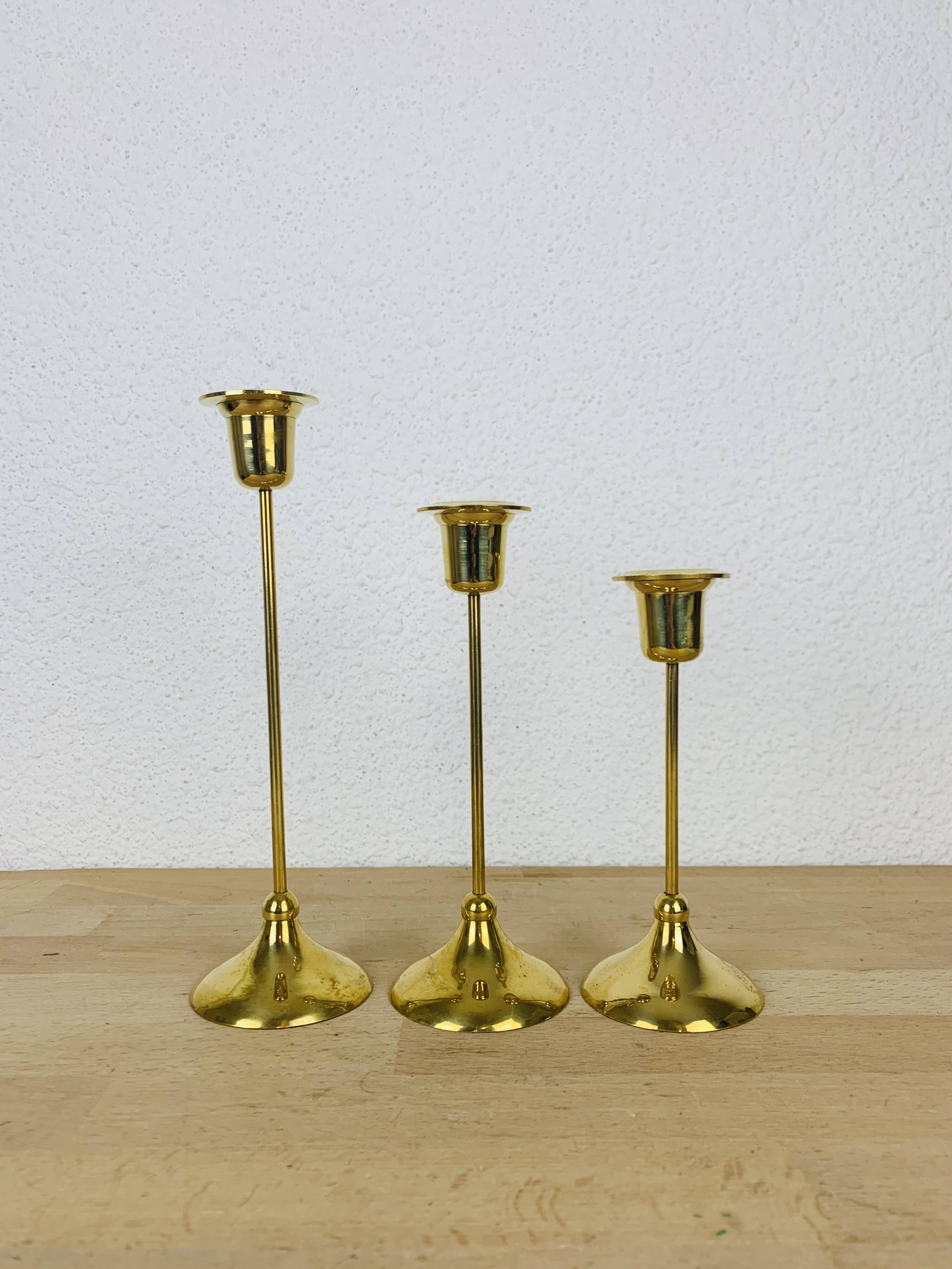 3 Scandinavian style gold-plated brass candle holders
