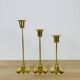 3 Scandinavian style gold-plated brass candle holders