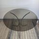 Vintage 1970s round metal and smoked glass table