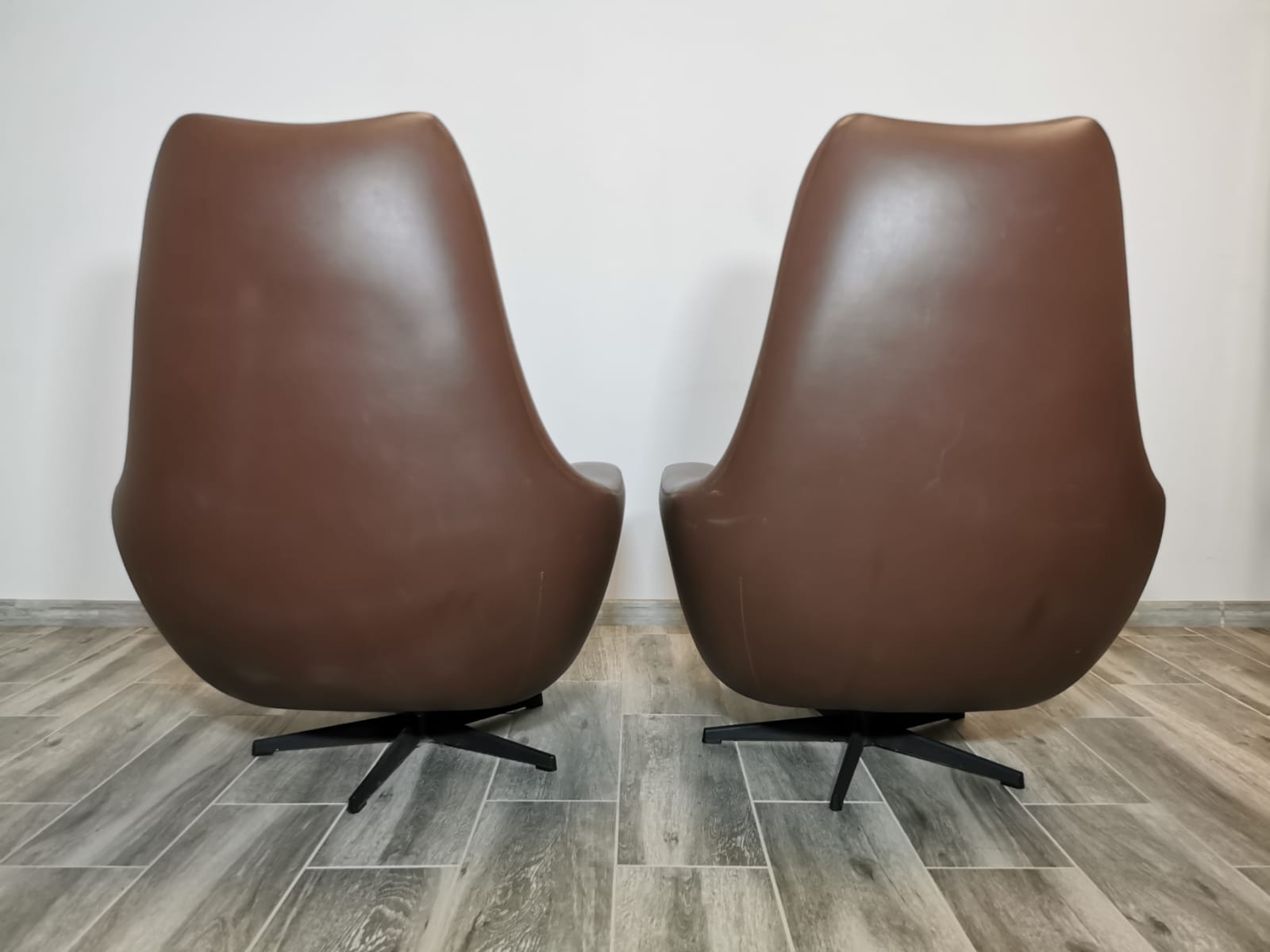 Mid century swivel armchairs